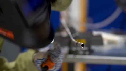 Preparation for welding work, worker man is protected by, gloves, mask close up. Stock Footage 126357760