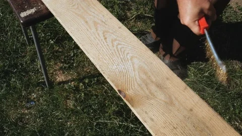 Preparation of wooden boards for processing. Cleaning the surface of the board Stock Footage 170775419