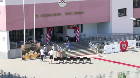 Preparations for celebrating graduation from school in 2020. Workers install  Stock Footage 132412448