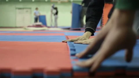 Preparations for the competition: the installation of the mat tatami Video stock 57377169