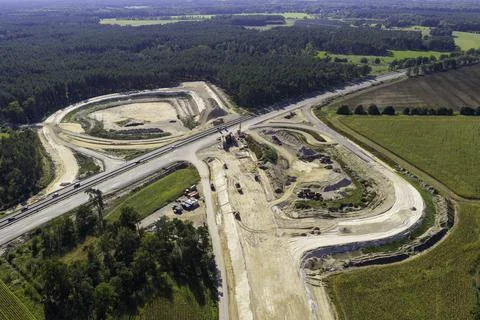 Preparatory work for a bridge being built over a highway Stock Photos