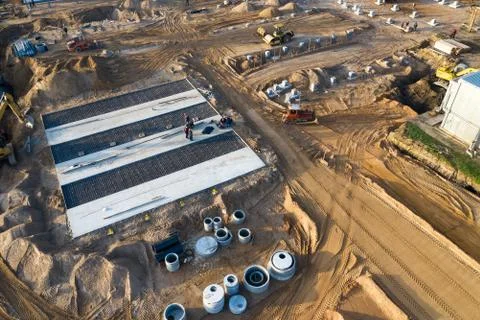 Preparatory work on the construction site for the construction of an industri Stock Photos