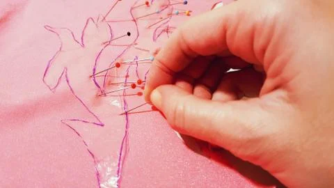 Preparatory work for tailoring a costume for performance. Fixing the template Stock Photos
