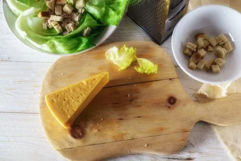 Prepare Caesar salad Stock Photos