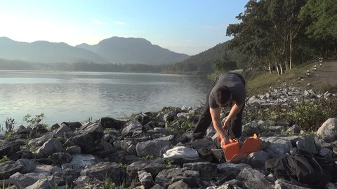 Prepare camera be side a lake in Chiang Mai, Thailand Stock Footage 100903668