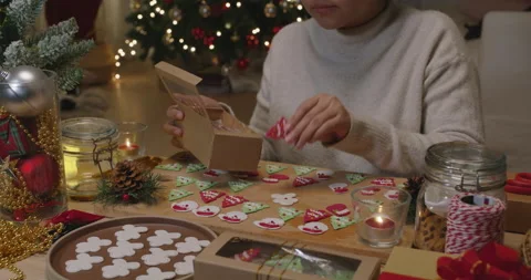Prepare colorful gingerman royal icing sugar cookie for X'mas gift. Stock Footage 162835587
