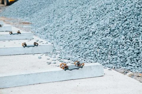 Prepare for a construction project at a site filled with piles of gravel and Stock Photos