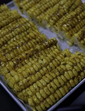 Prepare corn ribs before roasting. Stock Photos