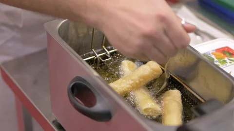 Prepare the dough in the oil Stock Footage 99882919