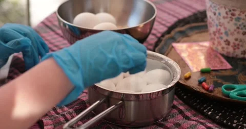 Prepare for Easter egg painting with fun step of egg painting process and hidden Stock Footage 306066285