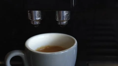 Prepare espresso coffee in an automatic coffee machine. Coffee Stock Footage 219554571