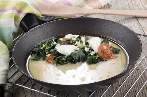 Prepare omelette in a pan Stock Photos
