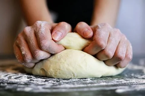 Prepare pizza dough hand the concept of food and its cooking process objec... Stock Photos