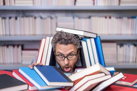 Prepare for school exam. stressed overworked millenial student read book Stock Photos
