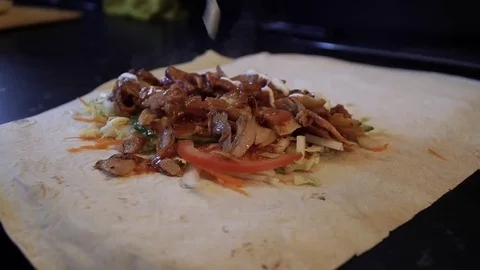 Prepare shawarma, cut the shred vegetables for shawarma Stock Footage 83981975
