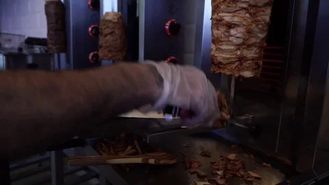 Prepare shawarma, meat on a spit Stock Footage 83966557