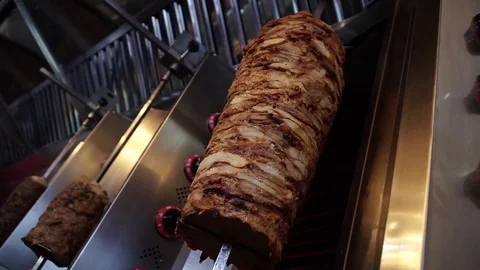 Prepare shawarma, meat on a spit Stock-Footage 83968082