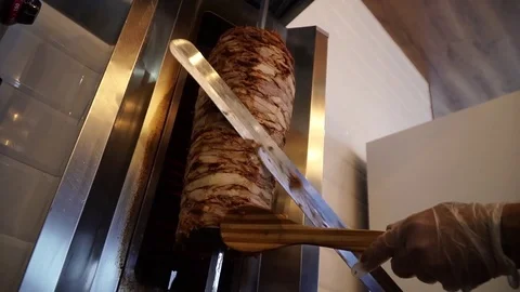 Prepare shawarma, meat on a spit Видео 83968858