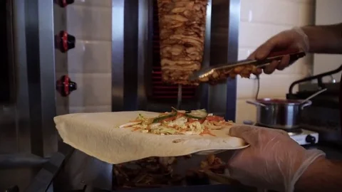 Prepare shawarma, meat on a spit Stock Footage 83980163
