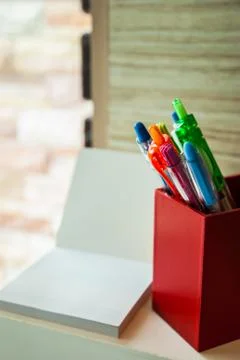 Prepare for write a message, box of pens and blank paper Foto stock