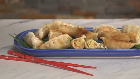 Prepared and Plated Vegetable Gyoza HD Video 動画素材 90299727