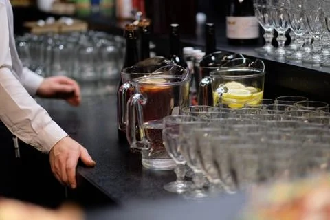Prepared for a buffet tableware on the bar for soft drinks and wine Stock Photos
