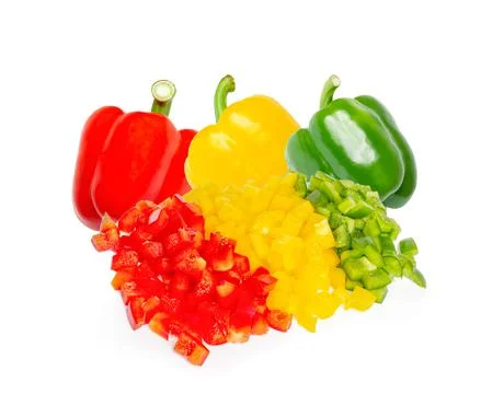 Prepared cube cut bell pepper on white background Stock Photos