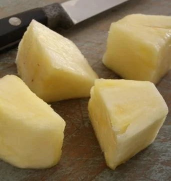 Prepared pineapple segments Stock Photos