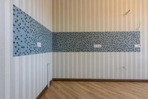 Prepared place for a kitchen in the interior of an empty room Foto stock