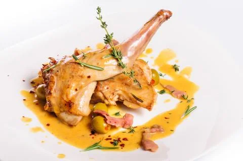 Prepared rabbit legs Stock Photos