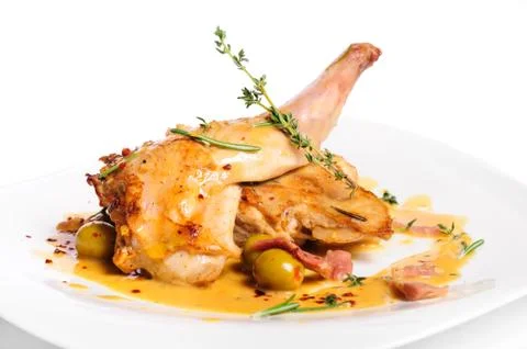 Prepared rabbit legs Stock Photos