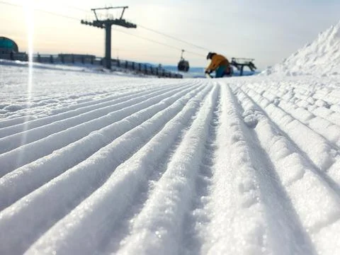 Prepared ski trail. Panoramic point of view the skier's feet on the descent s Stock Photos