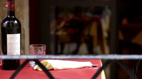 A prepared Table with a bottle of wine Stock Footage 92210781