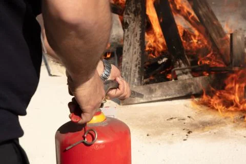 Preparedness for fire drill and training to use a fire extinguisher Stock Photos