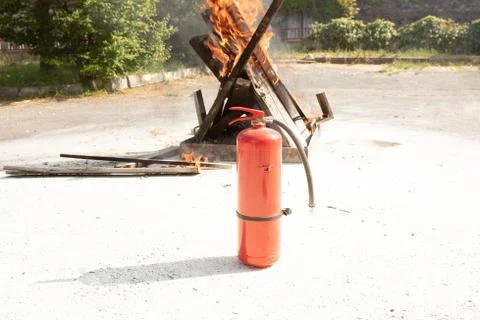 Preparedness for fire drill and training to use a fire extinguisher Stock Photos