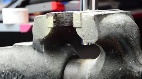 Prepareing a tube in a vice Video stock 41030903