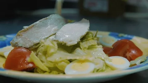 Prepares Caesar salad Stock Footage 84078772