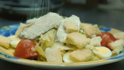 Prepares Caesar salad Stock Footage 84079122
