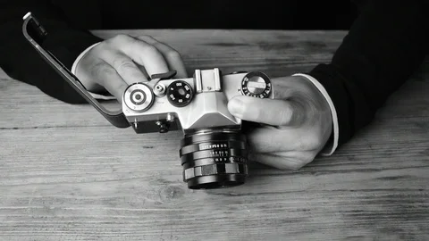 Prepares the camera for shooting black and white Stock Footage 112922665