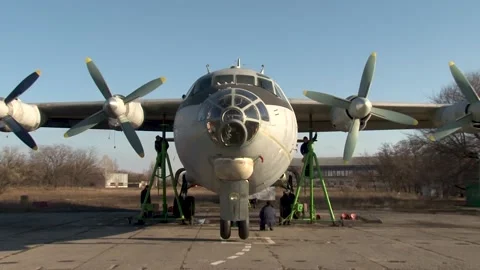 Preparing An-12 aircraft for control check of serviceability of landing gear. Stock Footage 171572411