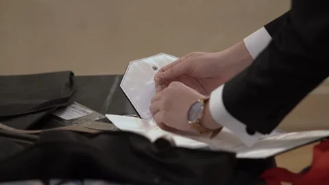Preparing Accessories For Wedding Day, Calmly Arranging Jewelry And Clothing Stock Footage 323773931