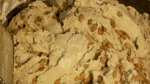 Preparing of almonds dough for desserts Stock Footage 77599098
