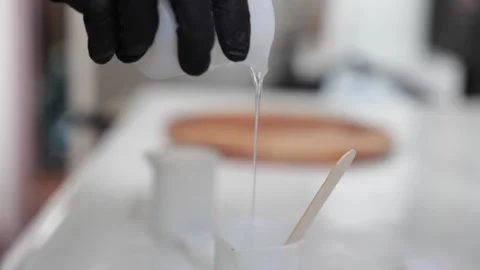 Preparing and applying resin, arts and crafts Stock Footage 158711670