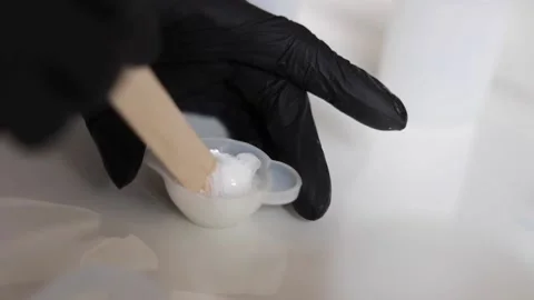 Preparing and applying resin, arts and crafts Stock Footage 158711707