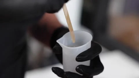 Preparing and applying resin, arts and crafts Stock Footage 158711743