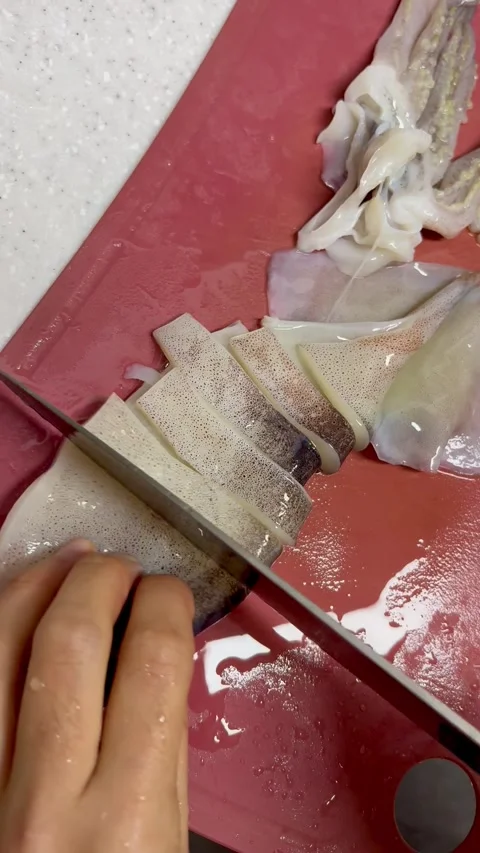 Preparing and cleaning fresh raw squid for Korean cooking Video stock 327048360