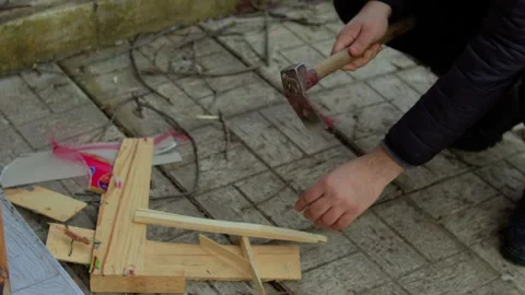 Preparing and cooking chicken in a traditional outdoor oven. Stock Footage 310017669