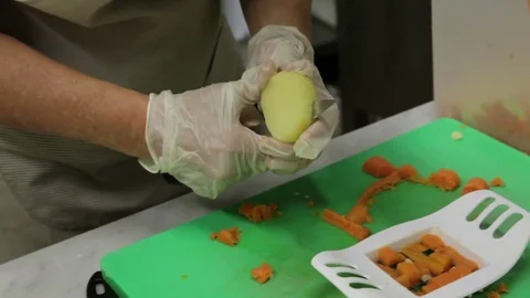 Preparing and cutting vegetables for salad Stock Footage 82176102