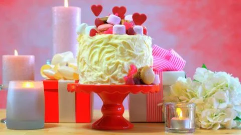 Preparing and decorating pink party table. Stock Photos