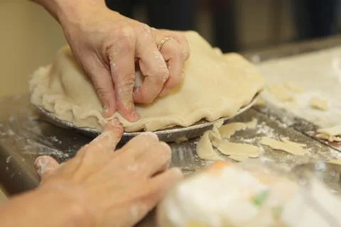 Preparing and making apple pies Stock Photos